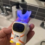 Sensory 360 Round U-Shaped Astronaut Design Mouthguard Electric Toothbrush for Kids Ages 2-7 - Automatic Memory Function - 5 Modes Toothbrush with Multiple Heads – Kids Travel Essentials (White) photo review