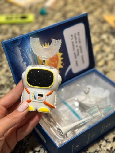 Sensory 360 Round U-Shaped Astronaut Design Mouthguard Electric Toothbrush for Kids Ages 2-7 - Automatic Memory Function - 5 Modes Toothbrush with Multiple Heads – Kids Travel Essentials (White) photo review