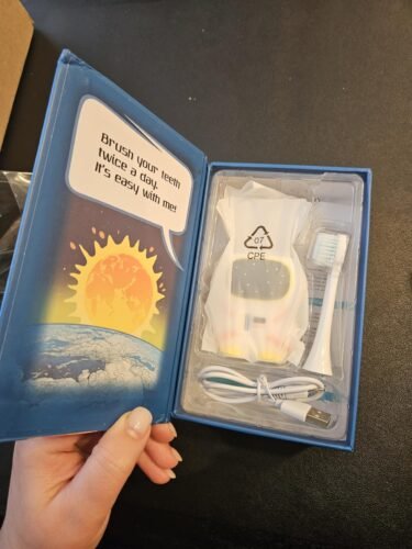 Sensory 360 Round U-Shaped Astronaut Design Mouthguard Electric Toothbrush for Kids Ages 2-7 - Automatic Memory Function - 5 Modes Toothbrush with Multiple Heads – Kids Travel Essentials (White) photo review