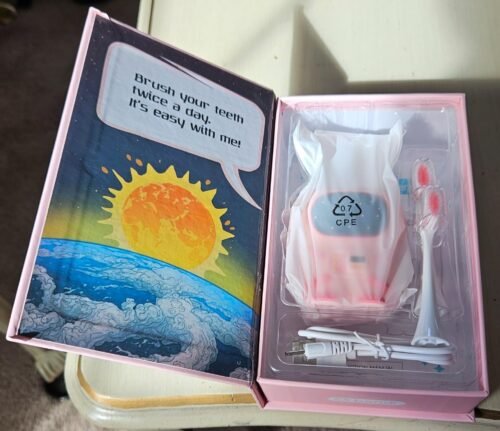 Sensory 360 Round U-Shaped Astronaut Design Mouthguard Electric Toothbrush for Kids Ages 2-7 - Automatic Memory Function - 5 Modes Toothbrush with Multiple Heads – Kids Travel Essentials (White) photo review