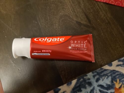 Colgate Optic White Stain Fighter Teeth Whitening Toothpaste. Anticavity Fluoride Toothpaste for Whitening Teeth. Helps Remove Daily Surface Stains. Clean Mint Paste. 4 Pack. 4.2 oz photo review